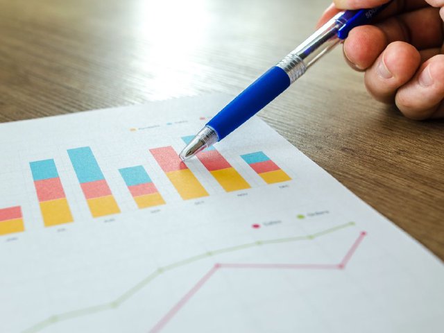 Spreadsheets and ledgers used to track small-business accounts